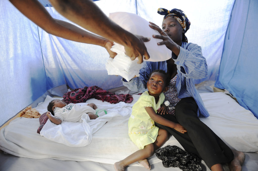 Marie Sylsalve received a Baby Care Kit for baby McAnley who was born 12 days after the earthquake struck Haiti