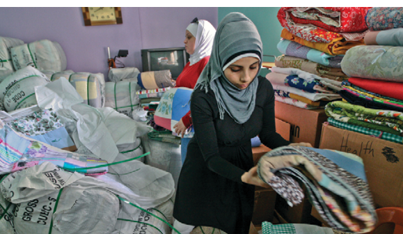 Charlotte Bruneau ANERA Lebanon            Relief for refugees from Syria in Lebanon  ANERA shipped 24,000 quilts, donated by Lutheran World Relief, to Palestinian refugees from Syria in camps across Lebanon 