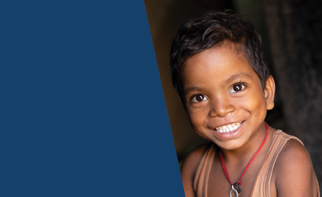 Arian (4), whose family participates in Partnership Bihar, peers out of the doorway of his home in Bihar, India, where Lutheran World Relief is working though Partnership Bihar to bring better farming techniques, high-quality seeds, improved nutrition for families, and microfinance self-help groups to communities in one of India s poorest states    Pradan (Professional Assistance for Development Action)   Partnership Bihar project   November 20, 2019 - Jamui District, Bihar State, India  Photo by Jake Lyell for Lutheran World Relief 