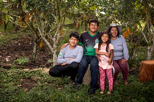 Daria Hinostroza Prado, a 42-year-old mother of two (Sarita Maricruz Urbano Hinostroza and Jesuar “Rodrigo” Urbano Hinostroza), and her husband William Urbano Quispe are key members of the Qori Warmi women's cacao cooperative supported by Lutheran World Relief in Peru.