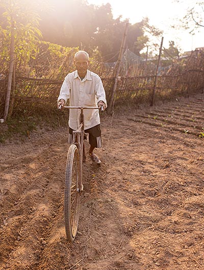 Nageswor made a plow out of a bicycle to cultivate his crops 