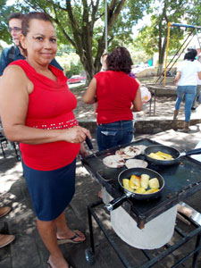 woman cooking on a new stove