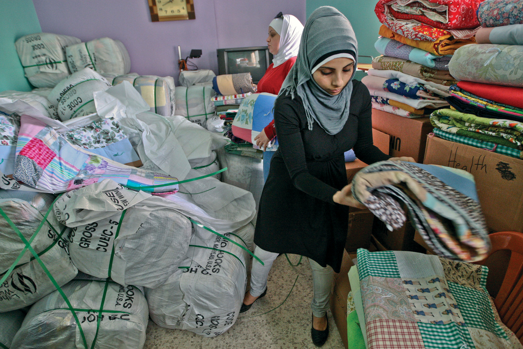 ANERA shipped 24,000 quilts, donated by Lutheran World Relief, to Palestinian refugees from Syria in camps across Lebanon. (Credit: Charlotte Bruneau/ANERA)