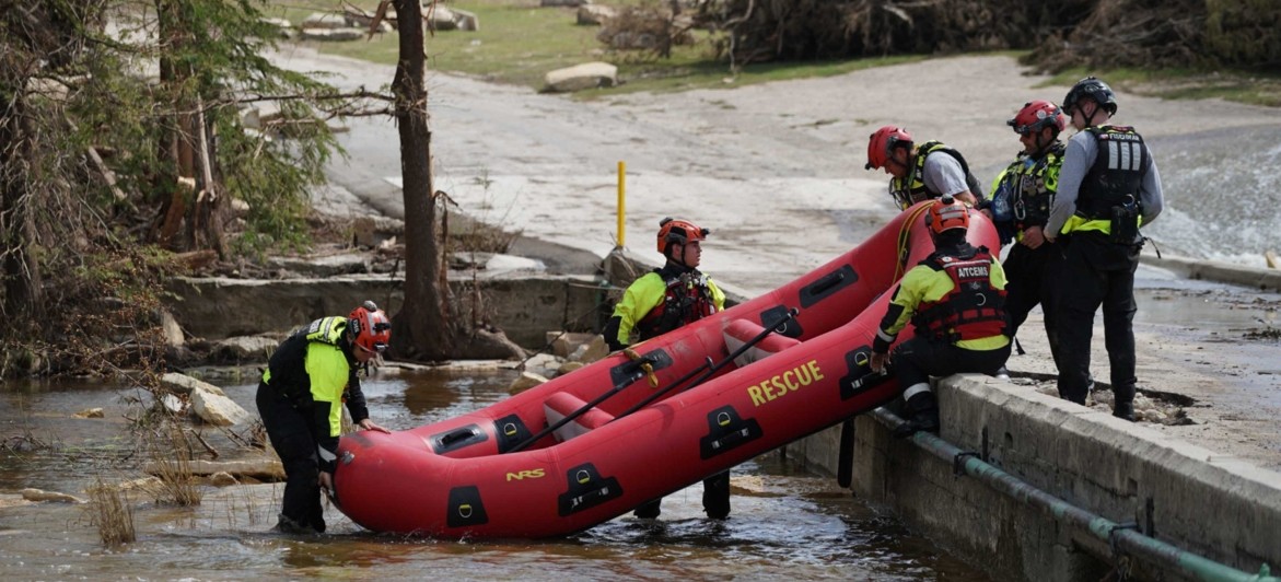 Rescue crews search the flood zone in Texas