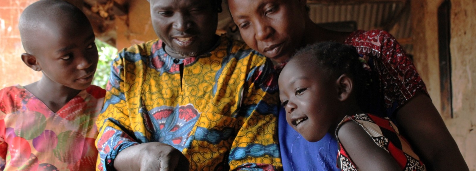 Wadamba Dison (52) and his wife Nafuna Oliver (48) grow coffee for Mountain Harvest on their farm in the Mayiyi region of Mt. Elgon, Uganda to support their family.