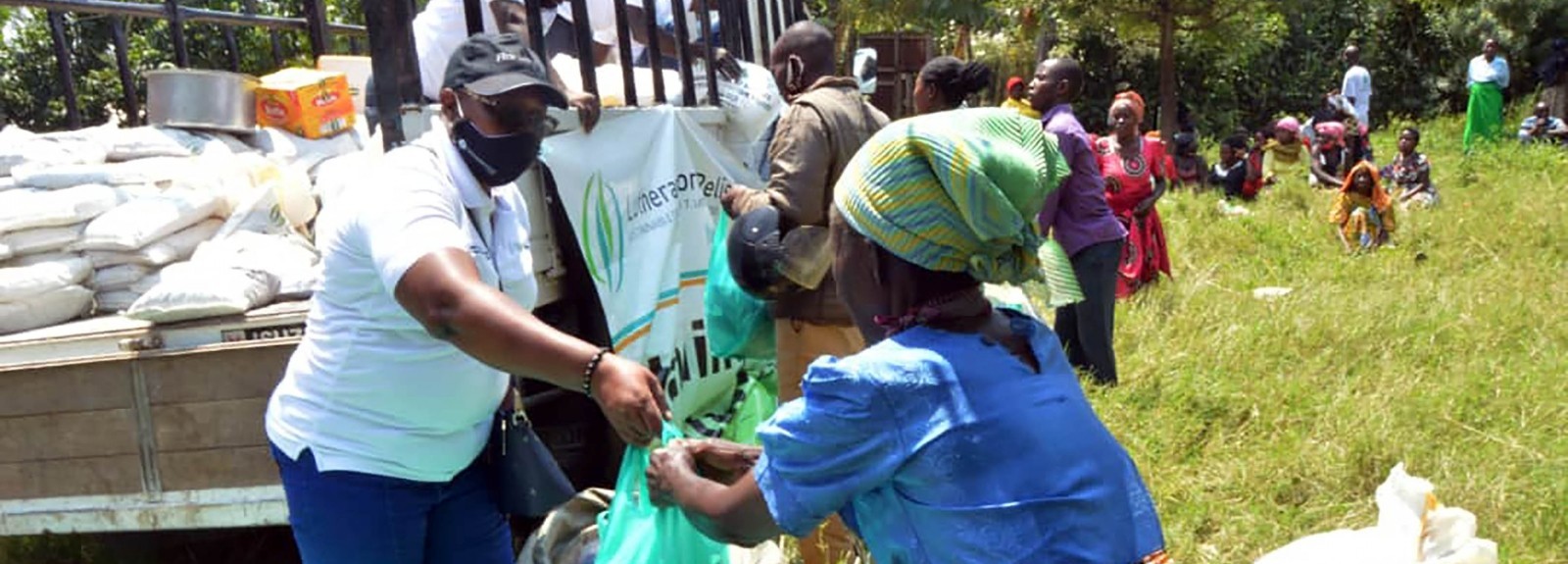 LWR conducts emergency food and supply distribution to communities affected by flooding in the Kasese District of Uganda. Photo by Roy Magoba/Lutheran World Relief. 