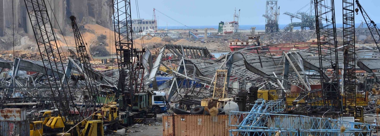 An ammonium nitrate explosion wrecked Beirut's primary grain storage facility. Lebanon imports most of its food through this port, and its closure is expected to drive up food prices yet again. (Matt Hackworth/Corus International)