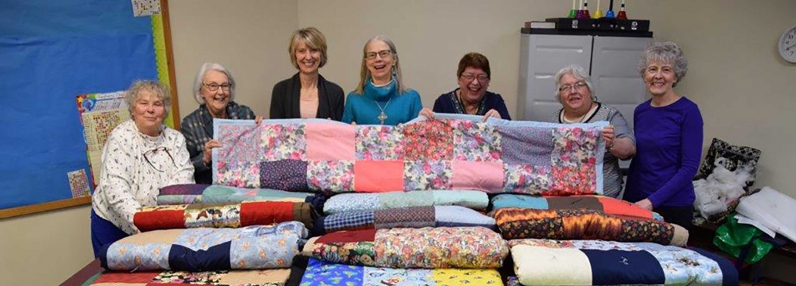 When Ruth Lunde (pictured here, center) heard about the needs of our neighbors around the world, she prayed and asked, "What can I do?" Today her generosity has inspired her congregation to make a world of difference.