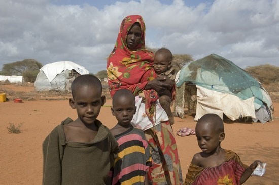 A family in the refugee camp in Dadaab, Kenya. (Photo by Jonathan Ernst)