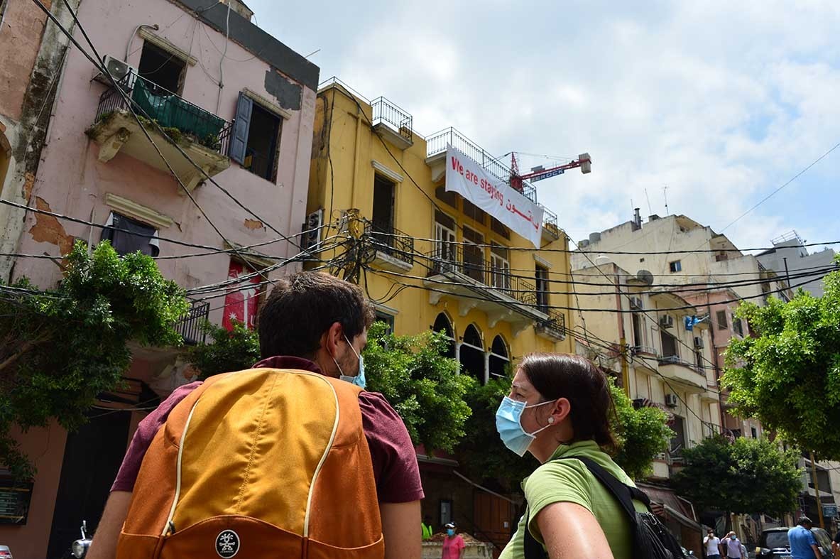 The team surveys damage on Gemmayzeh Street.