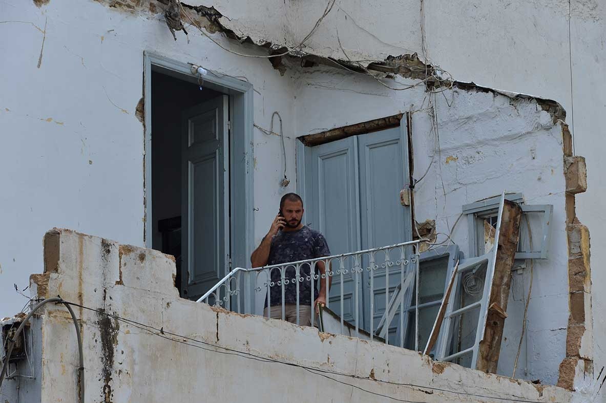 Surveying damage in Karantina, one of Beirut's poorest neighborhoods.