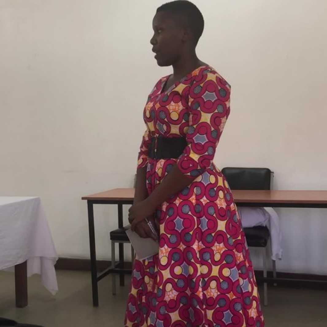 Upendo presents her proposal on environment-friendly cooking briquettes.