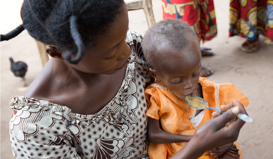 Mado eats weaning food made of locally available ingredients.