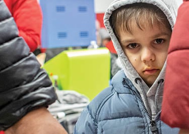 Olena Pokusa (33) with her son Tumyr (5) in the Kraków Główny Main Station after arriving from Ukraine  Olena's parents were also traveling with them but some of her other family members are still in Ukraine tending to their many animals  She plans to stay with her brother in Gdansk, Poland 